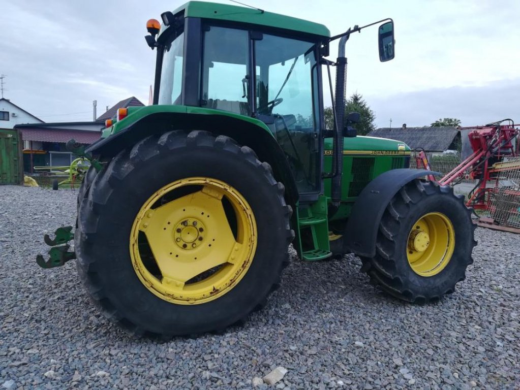 Oldtimer-Traktor tip John Deere 6400, Neumaschine in Белз (Poză 1)