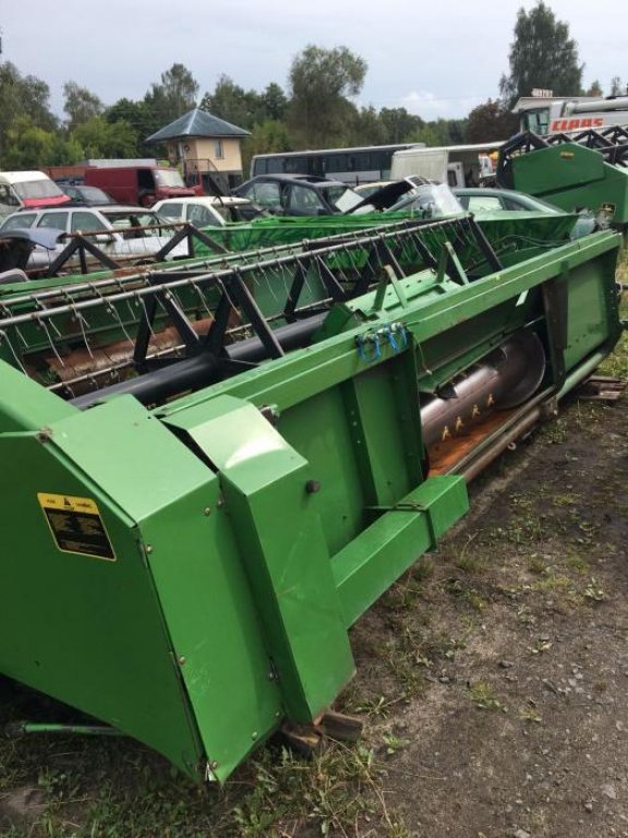 Oldtimer-Mähdrescher van het type John Deere 1055, Neumaschine in Луцьк (Foto 3)