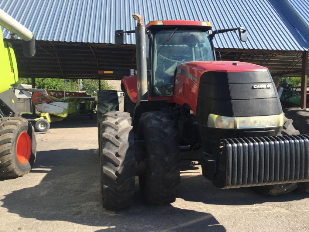 Oldtimer-Traktor del tipo Case IH Magnum 310, Neumaschine en Володарка (Imagen 1)