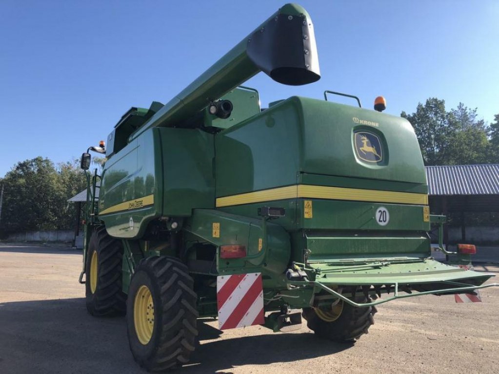 Oldtimer-Mähdrescher of the type John Deere T670i, Neumaschine in Володарка (Picture 9)