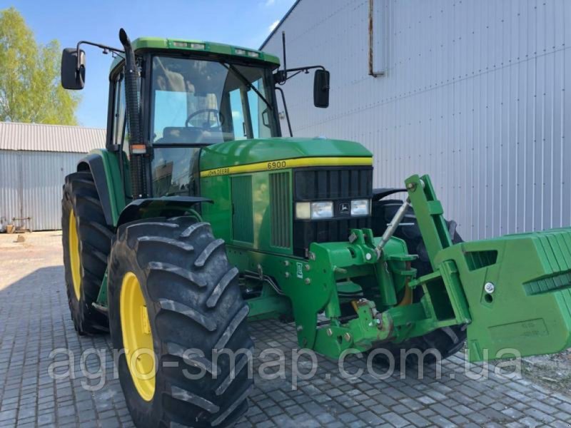 Oldtimer-Traktor van het type John Deere 6900, Neumaschine in Горохів (Foto 1)