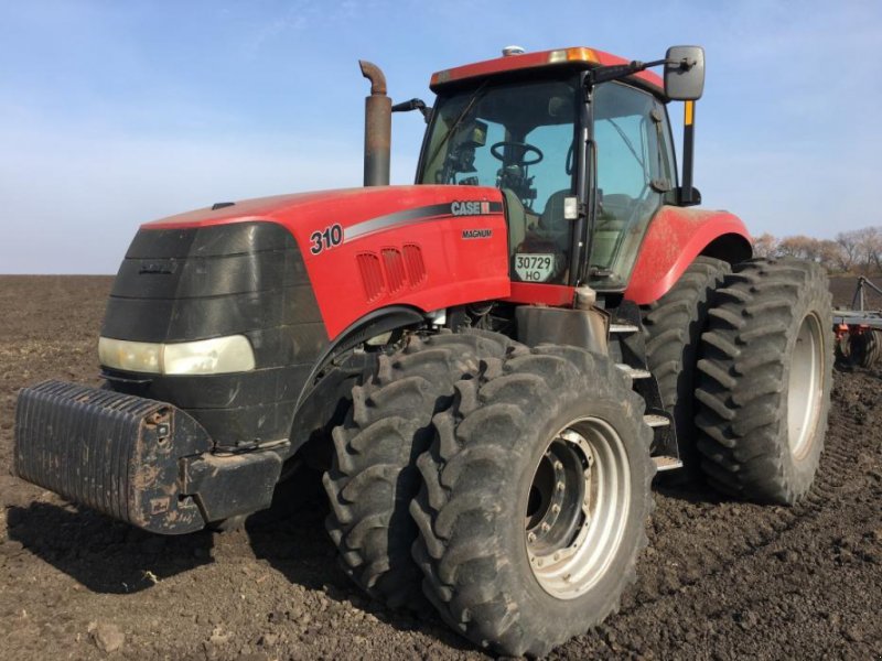 Oldtimer-Traktor Türe ait Case IH MX 310, Neumaschine içinde Київ (resim 1)