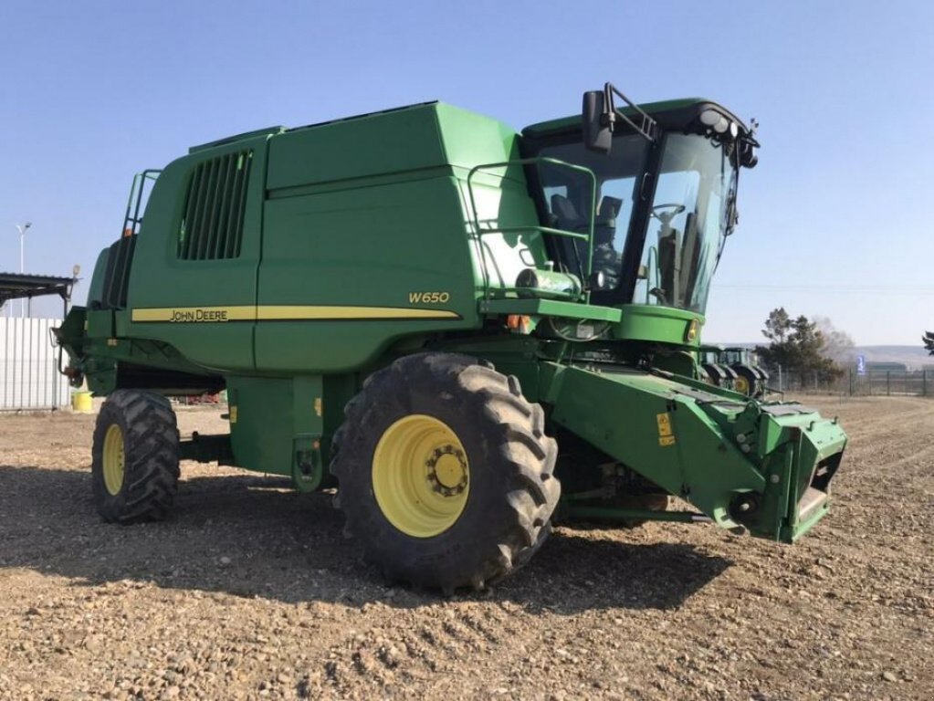 Oldtimer-Mähdrescher tipa John Deere W650, Gebrauchtmaschine u Путрівка (Slika 1)