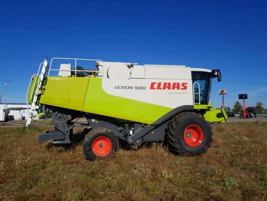 Oldtimer-Mähdrescher Türe ait CLAAS Lexion 580, Neumaschine içinde Путрівка (resim 5)