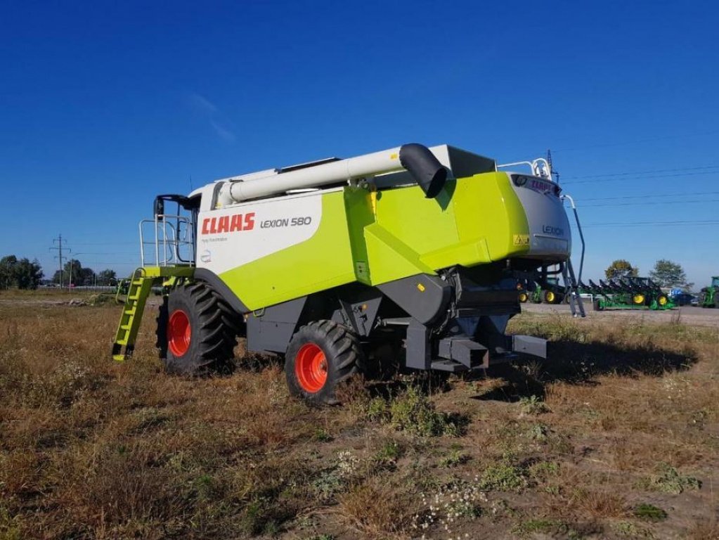 Oldtimer-Mähdrescher Türe ait CLAAS Lexion 580, Neumaschine içinde Путрівка (resim 9)