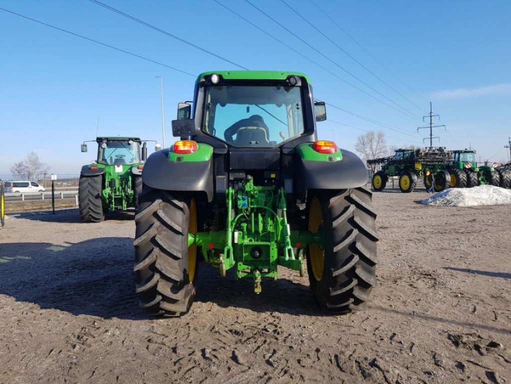 Oldtimer-Traktor des Typs John Deere 6140M, Neumaschine in Путрівка (Bild 9)