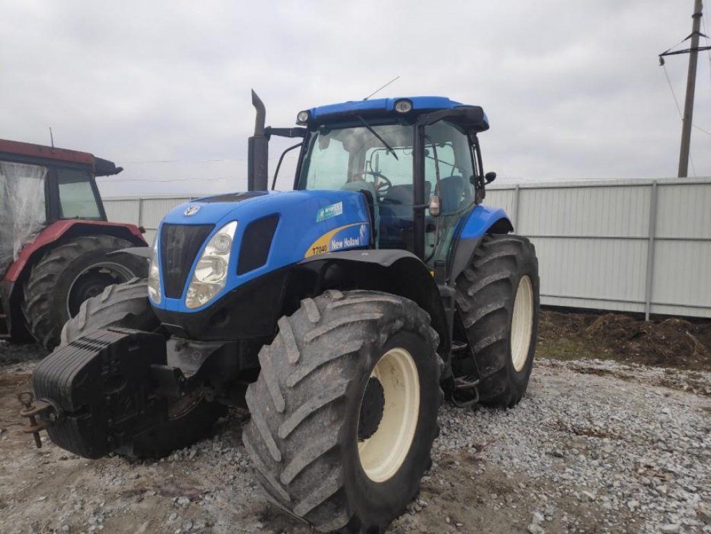 Oldtimer-Traktor of the type New Holland T7040, Neumaschine in Дніпро (Picture 1)