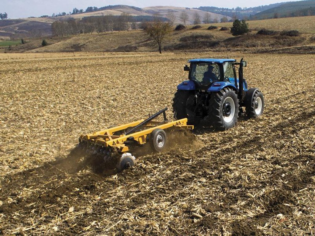 Oldtimer-Traktor del tipo New Holland T6050 Delta, Neumaschine en Хмельницький (Imagen 2)